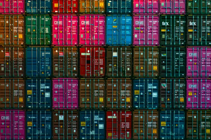 Stacked shipping containers in many colours